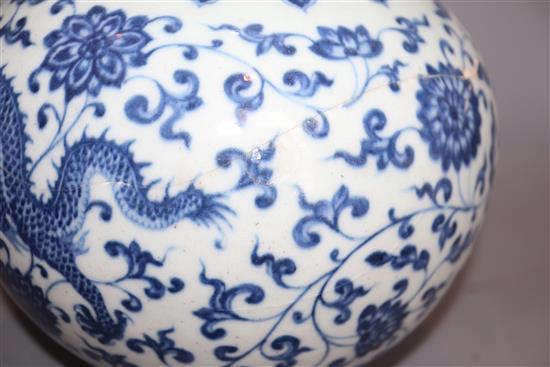 A Chinese blue and white dragon and phoenix double gourd vase , Qianlong mark but late 19th/early 20th century, H. 35.cm